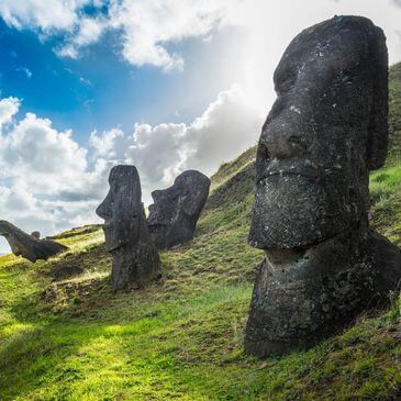 Travel agency offers tours to the Moai statues on the slopes of Rano Raraku, Easter Island.
