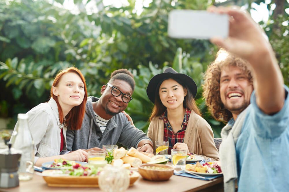 A group of happy friends taking a selfie together