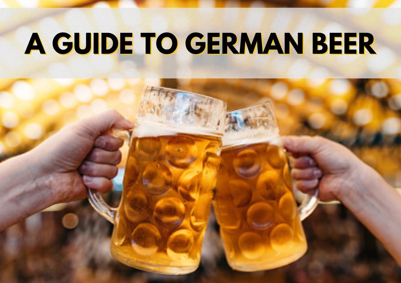 Two hands clinking beer steins against a bokeh background with the text "a guide to german beer.