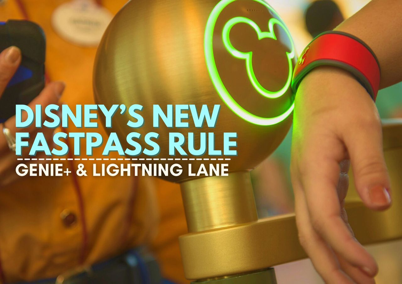 Person using a wristband to interact with a disney fastpass kiosk featuring genie+ and lightning lane services.