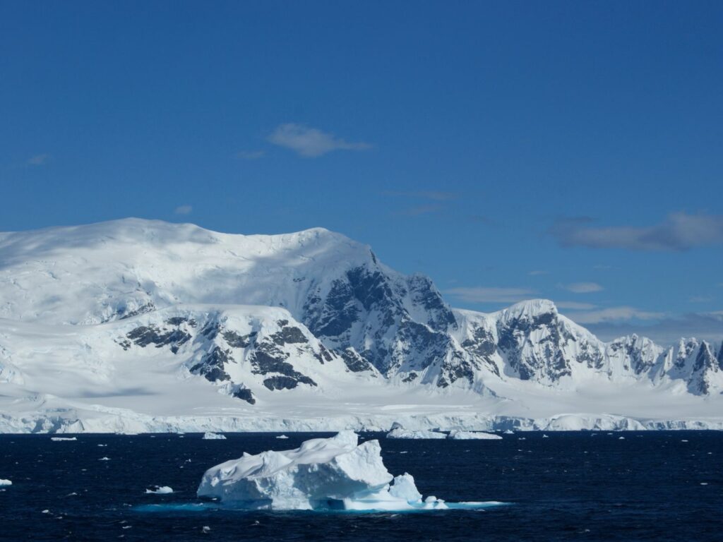 Icebergs and snowy mountains along the Antarctic Peninsula