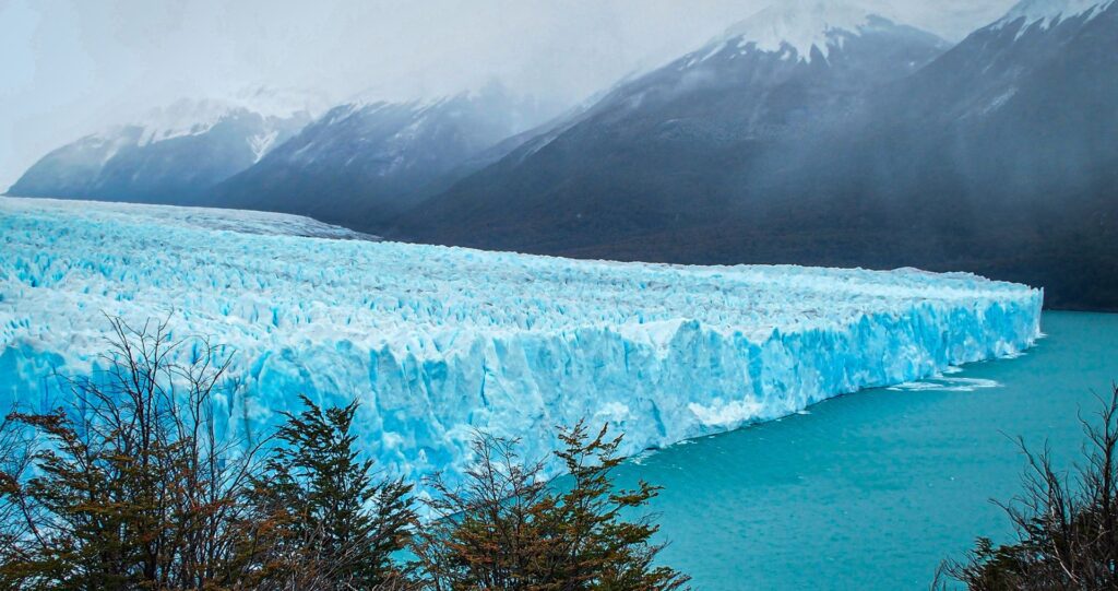 The Perito Moreno Glacier meeting a turquoise lake in Patagonia