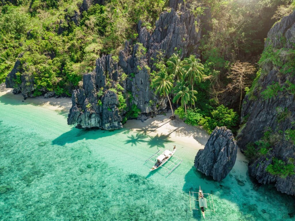 Limestone cliffs above a turquoise lagoon in El Nido, Palawan