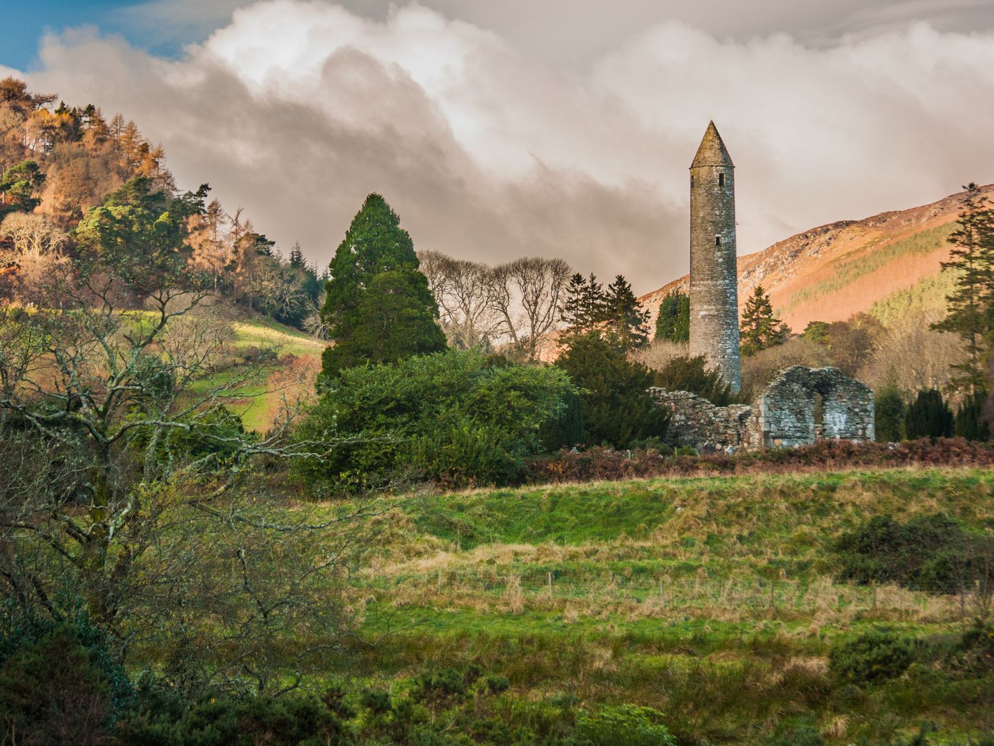 The round tower and ruins of the monastic site at Glendalough in the Wicklow Mountains