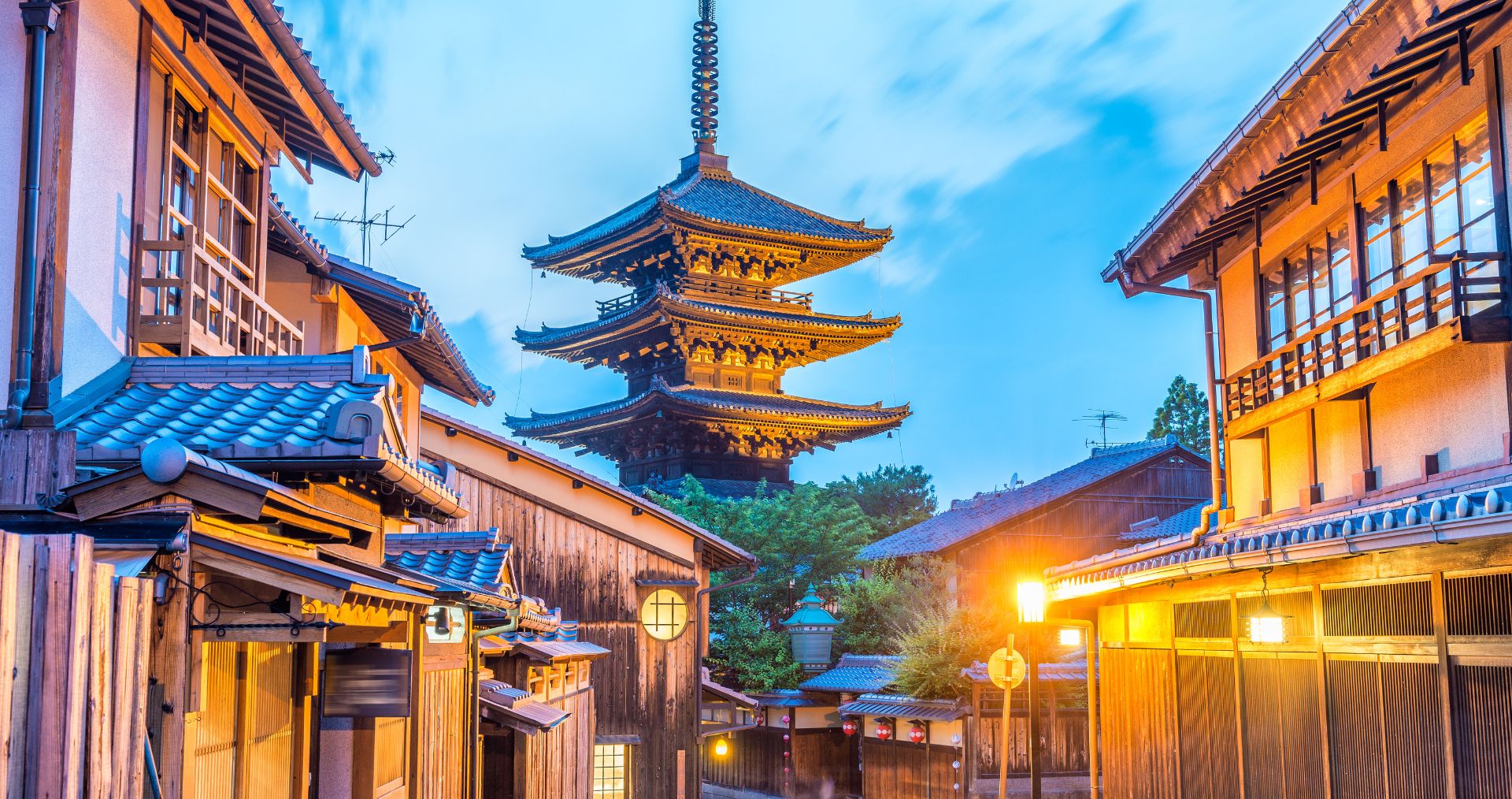 The Yasaka Pagoda rising above Kyoto’s Higashiyama rooftops at sunset