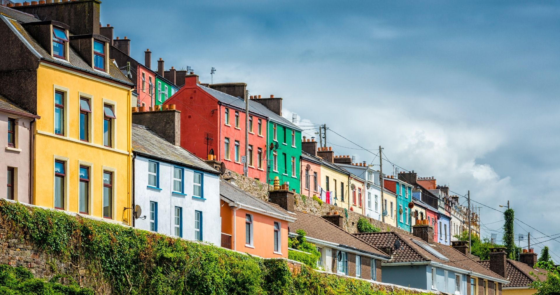 Colorful houses along the waterfront in Cobh, County Cork
