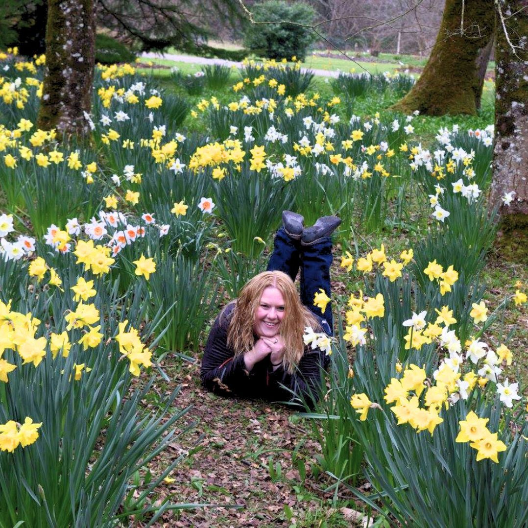 A Travel Byrds advisor among spring daffodils in an Irish woodland