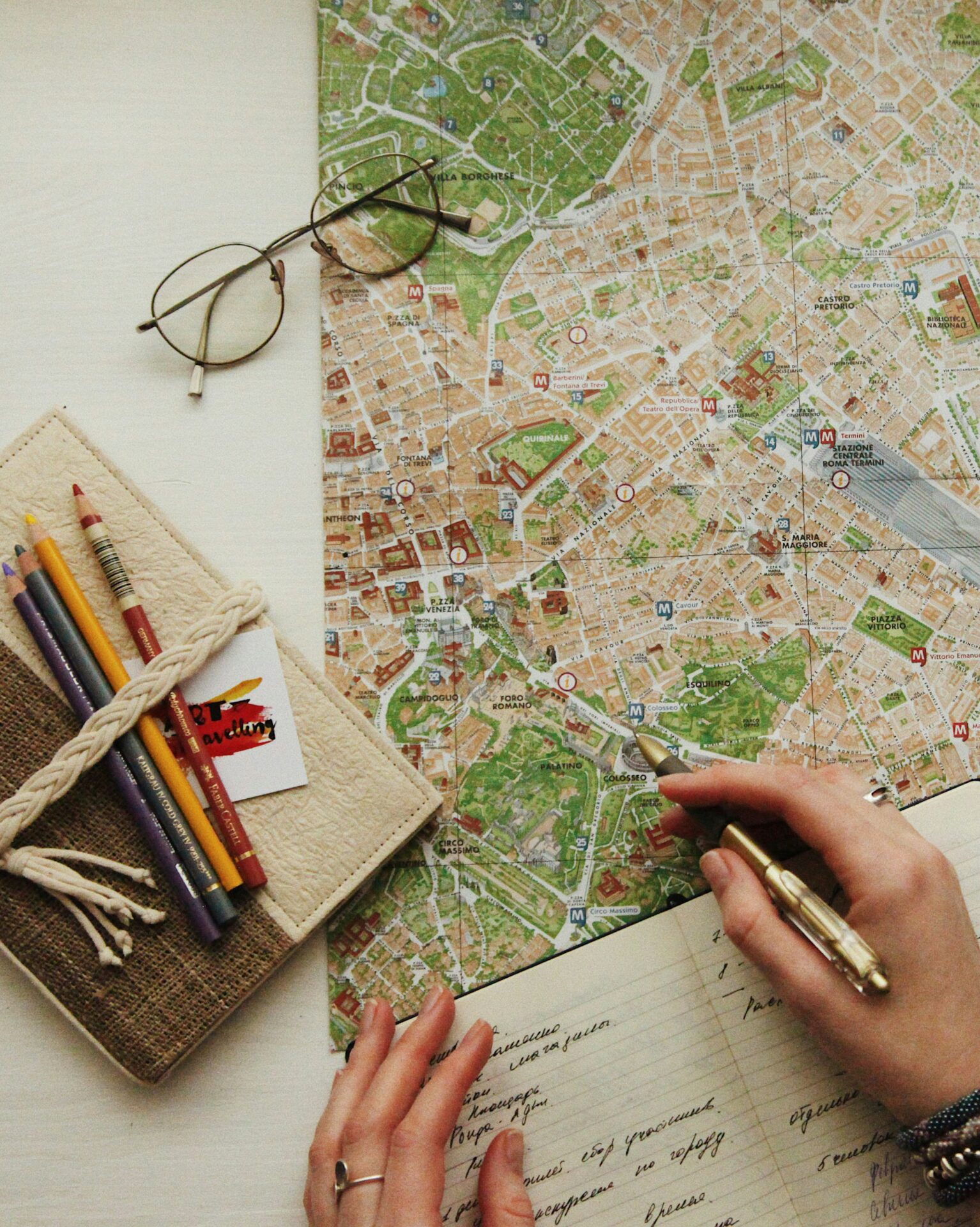 Planning a trip with a map and travel journal