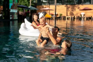 Children enjoying a lazy river at a family resort on Oahu, Hawaii