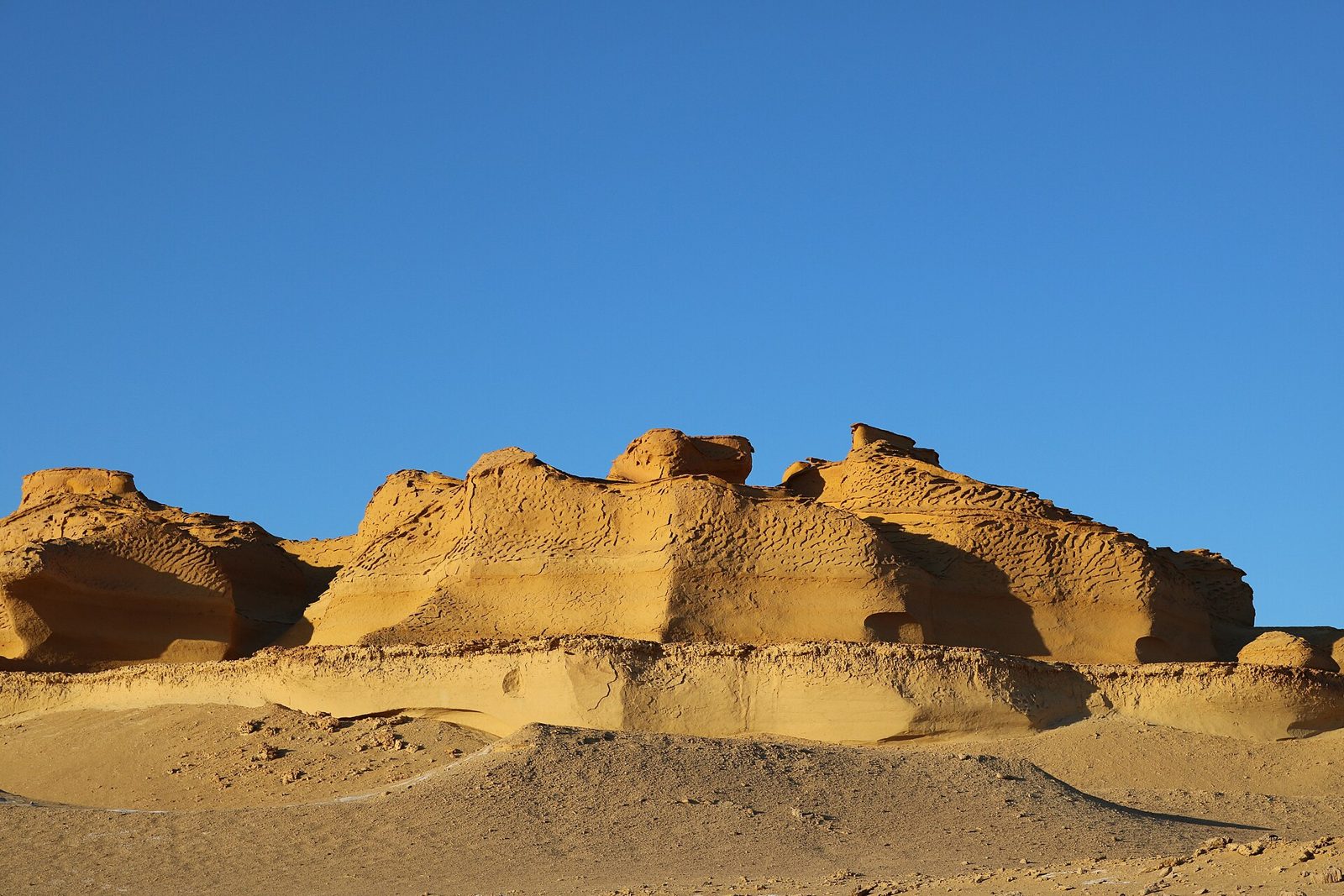 Wind-carved sandstone formations in Wadi El-Hitan