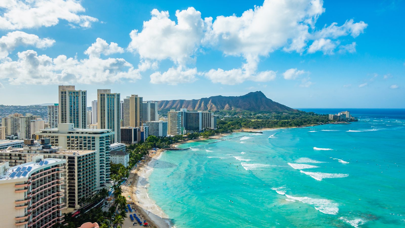 Turquoise surf along Waikiki Beach and Diamond Head, Hawaii