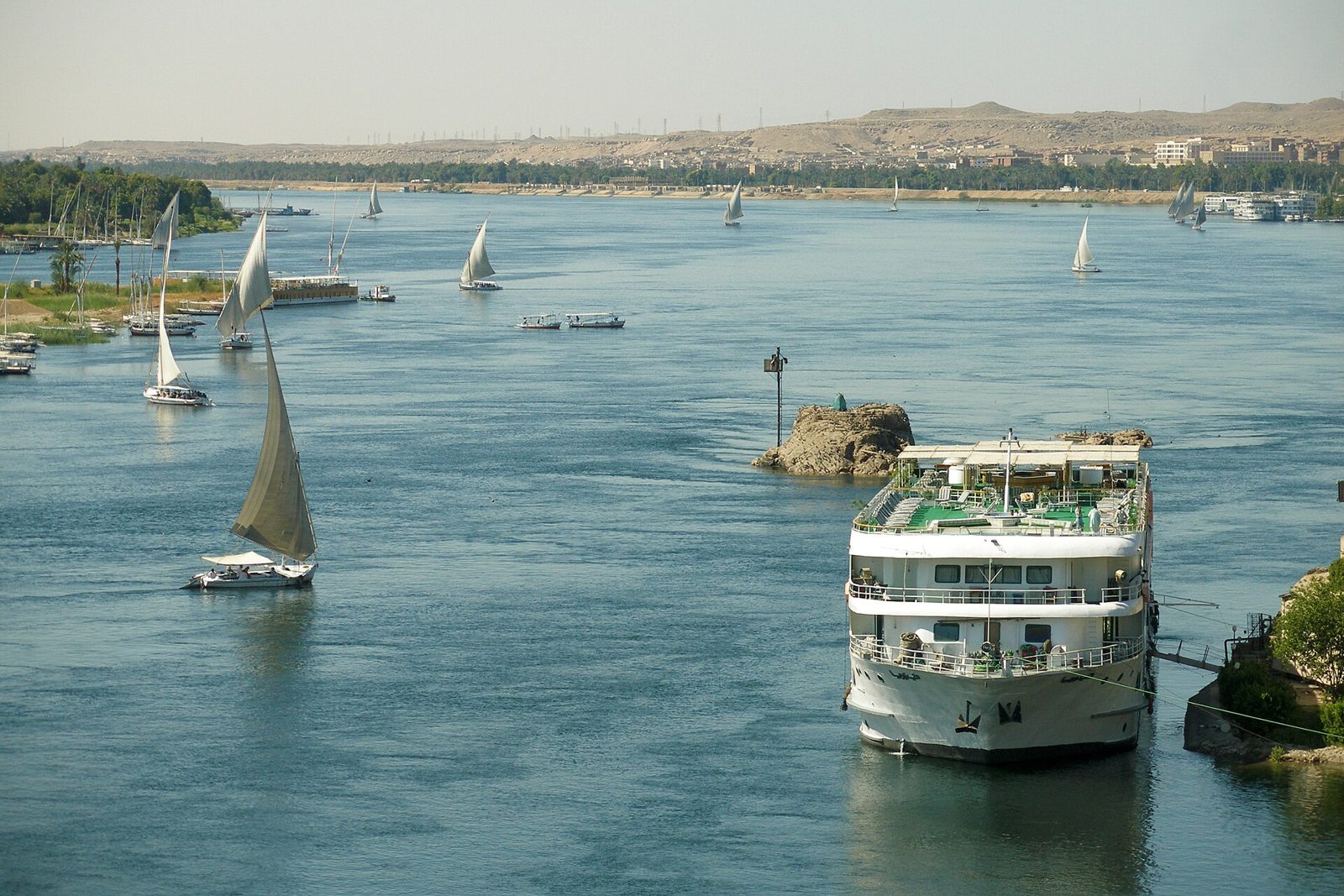 Nile cruise ship and feluccas near Aswan
